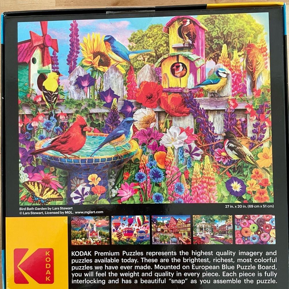 Jigsaw puzzle.  Kodak 1000pc “Bird Bath Garden”